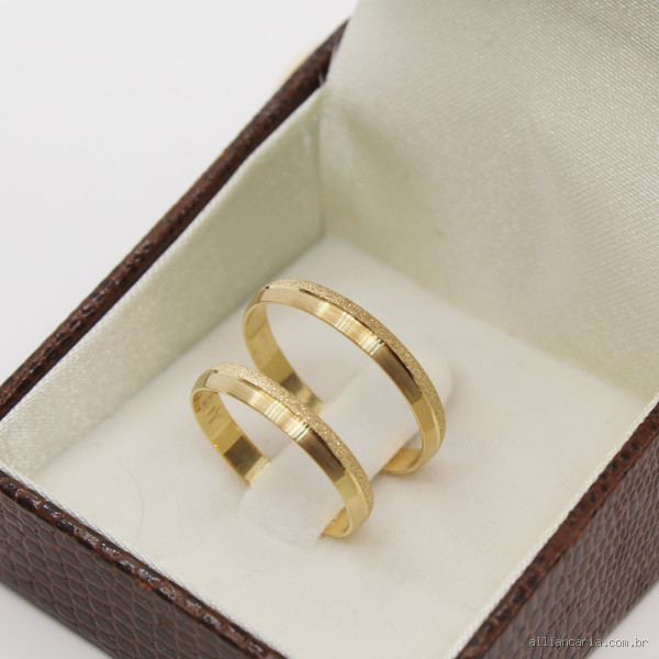 Quanto pesa uma aliança de ouro 18k?